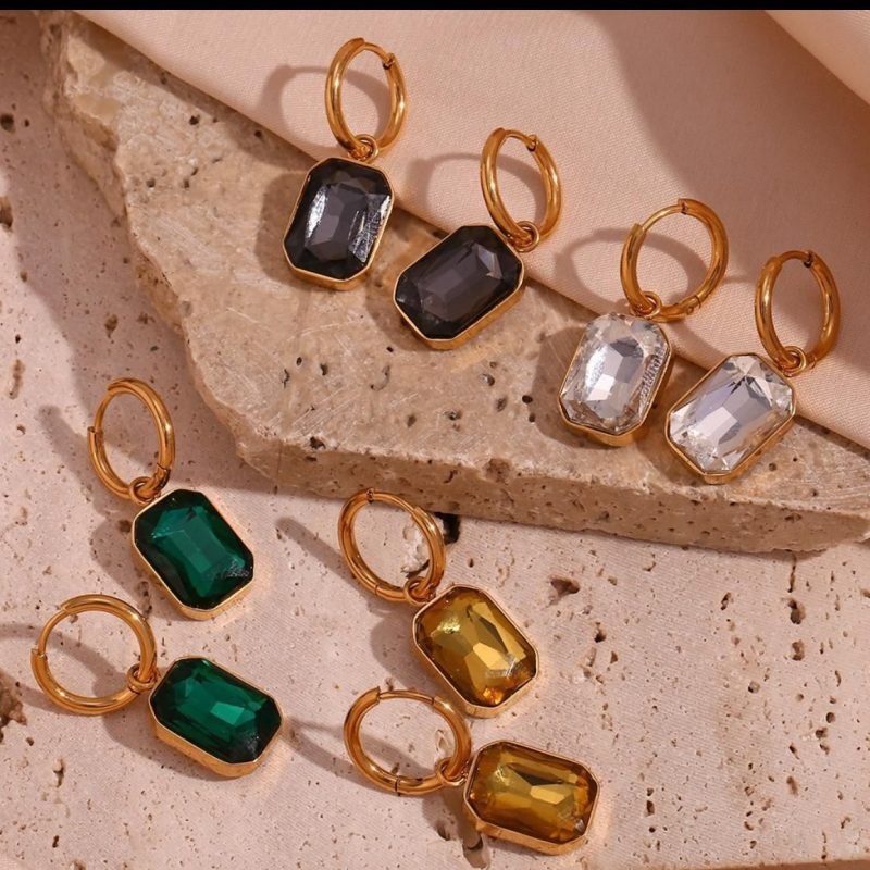 Caravanas cuadradas de acero y cristal