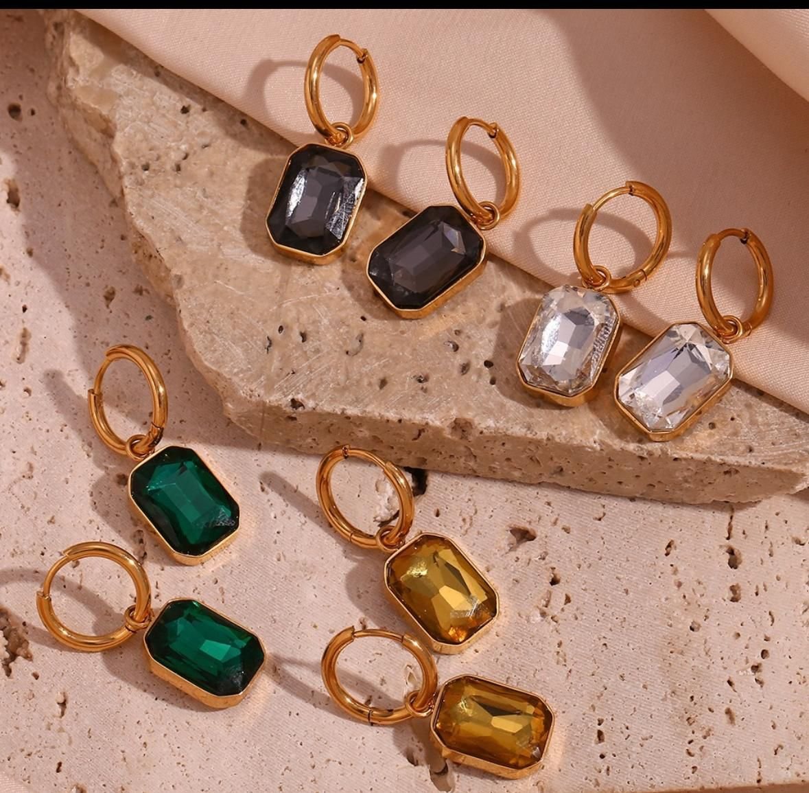 Caravanas cuadradas de acero y cristal